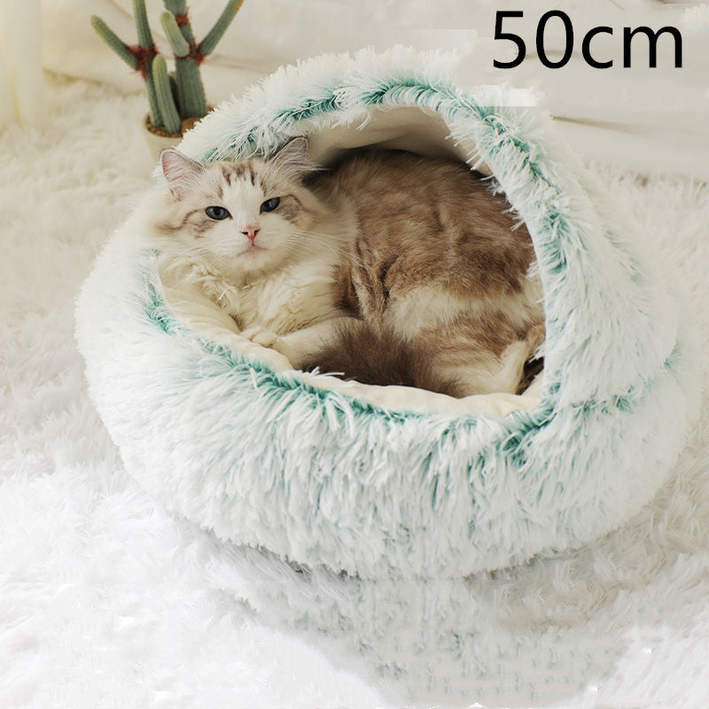 Katt i rund plyschbädd med huva