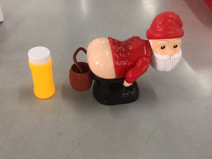 Tomte som blåser såpbubblor