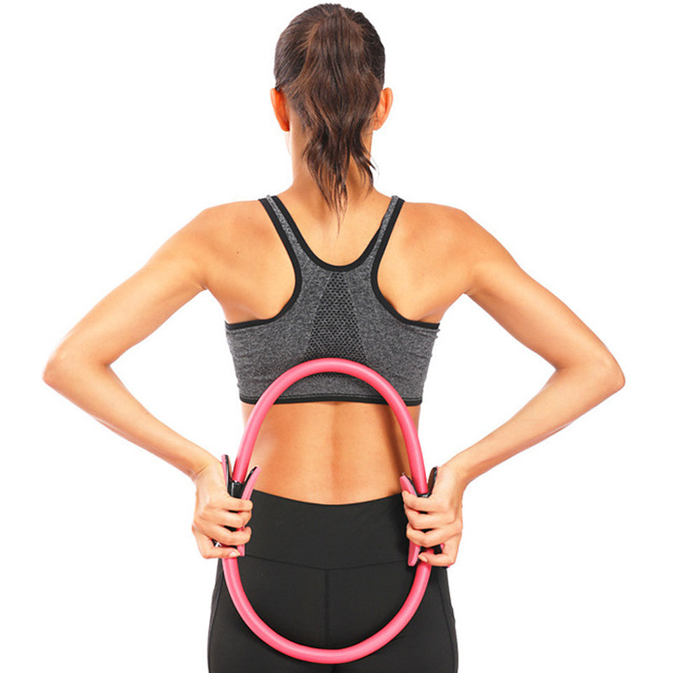 Lila pilatesring med vadderade handtag