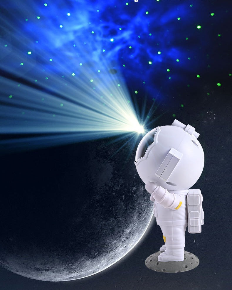 Astronautprojektor lyser blå nebulosa i tak