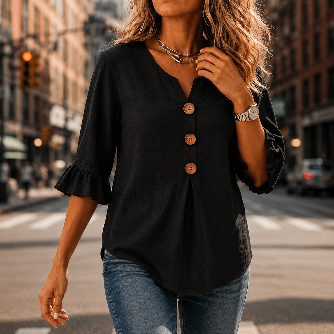 Laurelle – Blus z urringning w v-ringning i falbanami z knappar