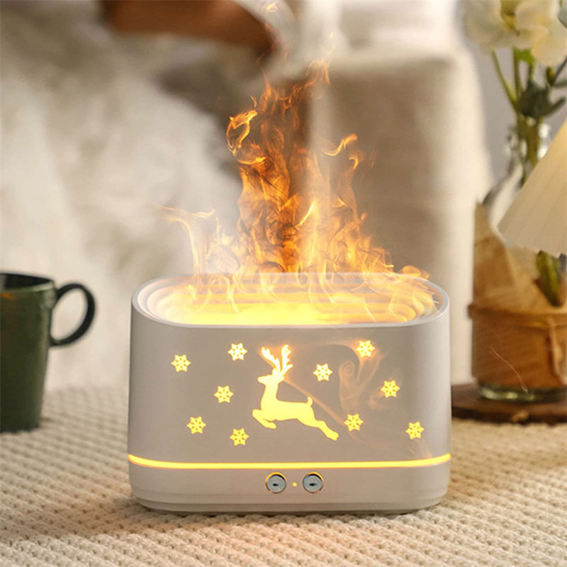 Vit doftspridare med ren och flamljus