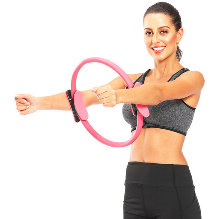 Lila pilatesring med vadderade handtag
