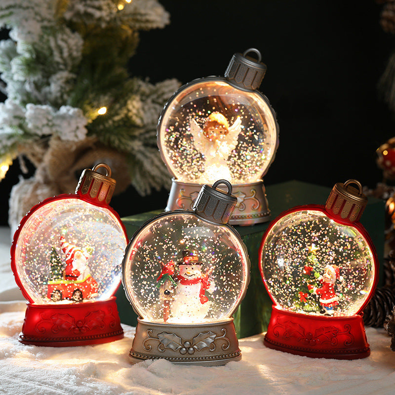 Upplyst glitterkula med snögubbe