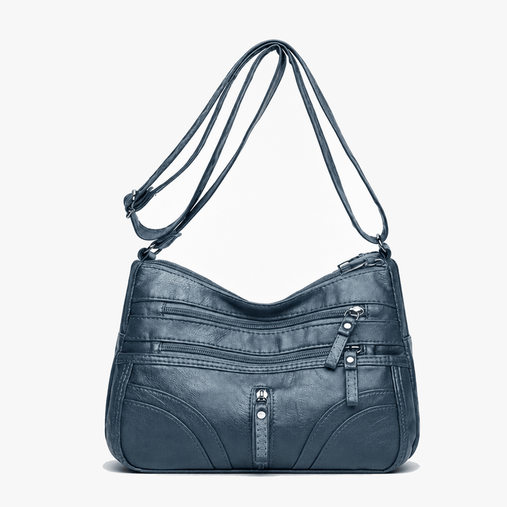 Caressa – Mjuk läder handväska crossbody med flera fickor