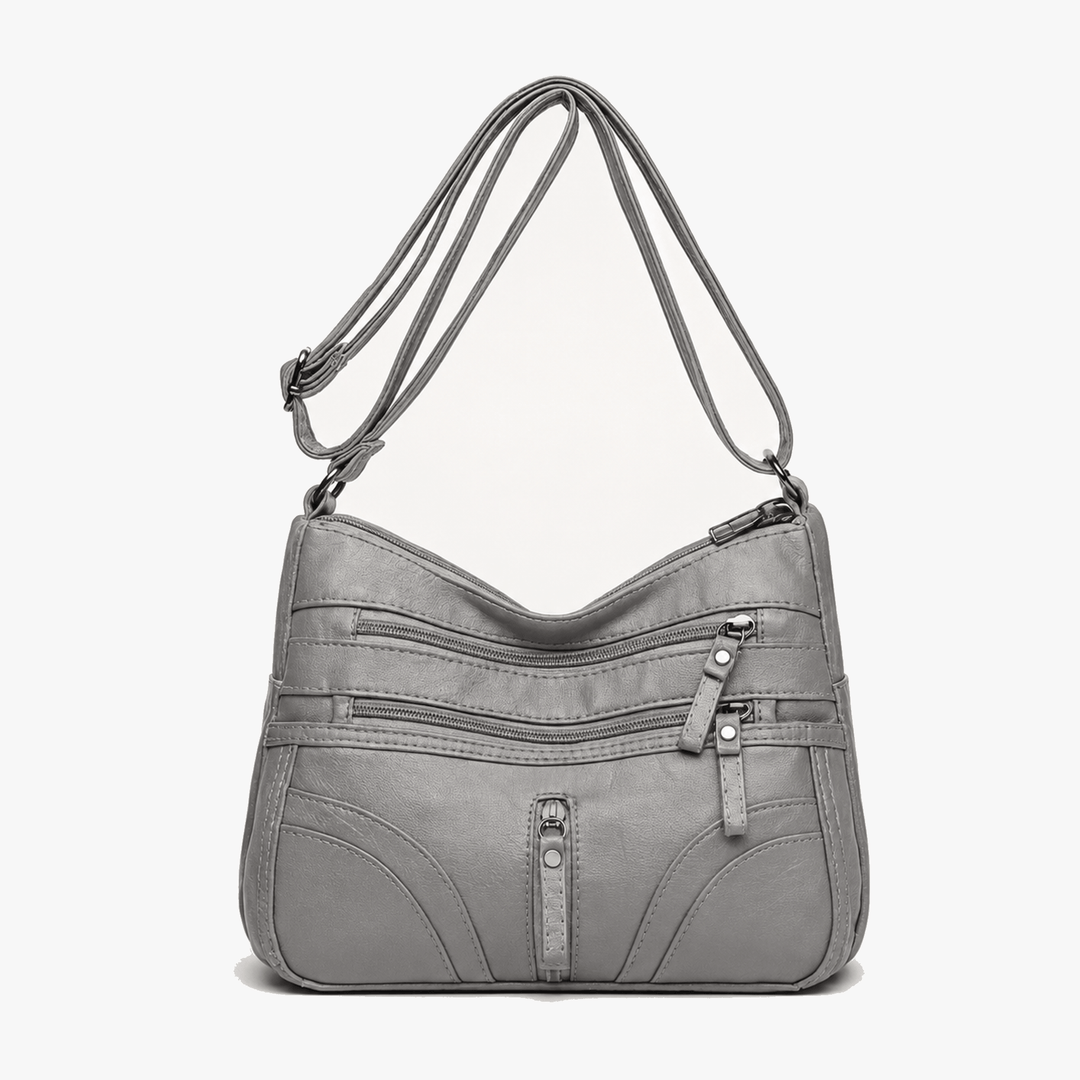 Caressa – Mjuk läder handväska crossbody med flera fickor