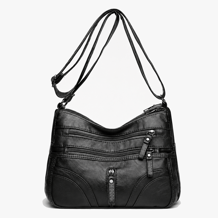 Caressa – Mjuk läder handväska crossbody med flera fickor