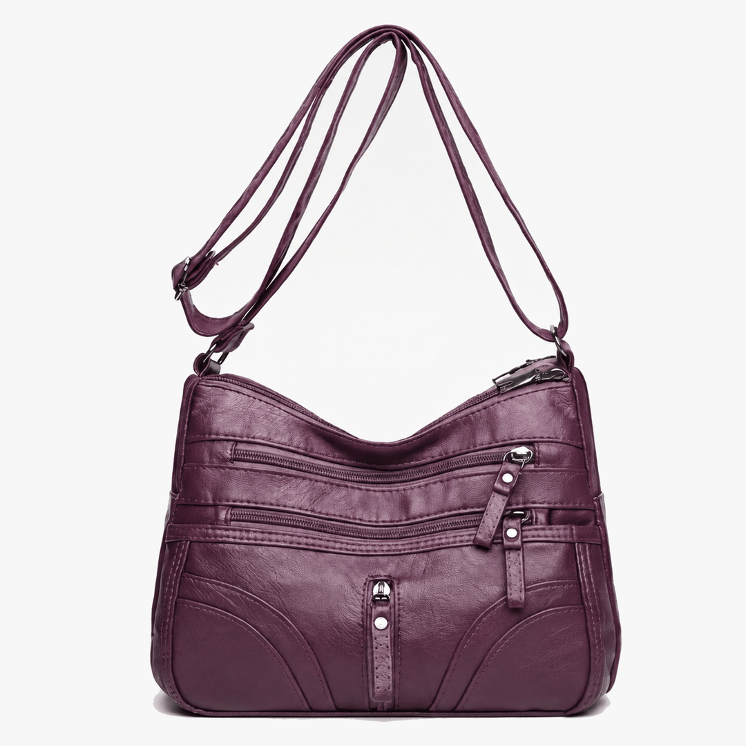Caressa – Mjuk läder handväska crossbody med flera fickor