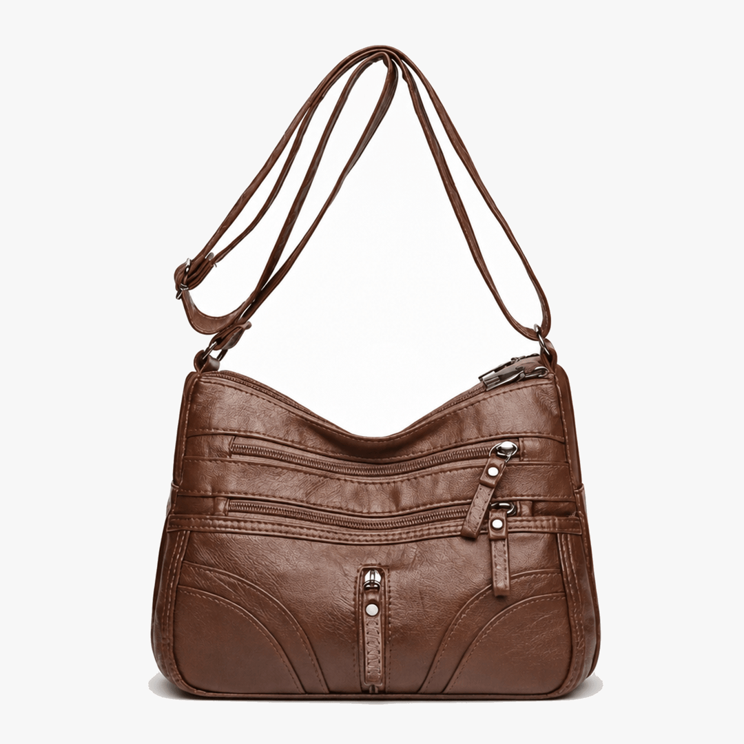 Caressa – Mjuk läder handväska crossbody med flera fickor
