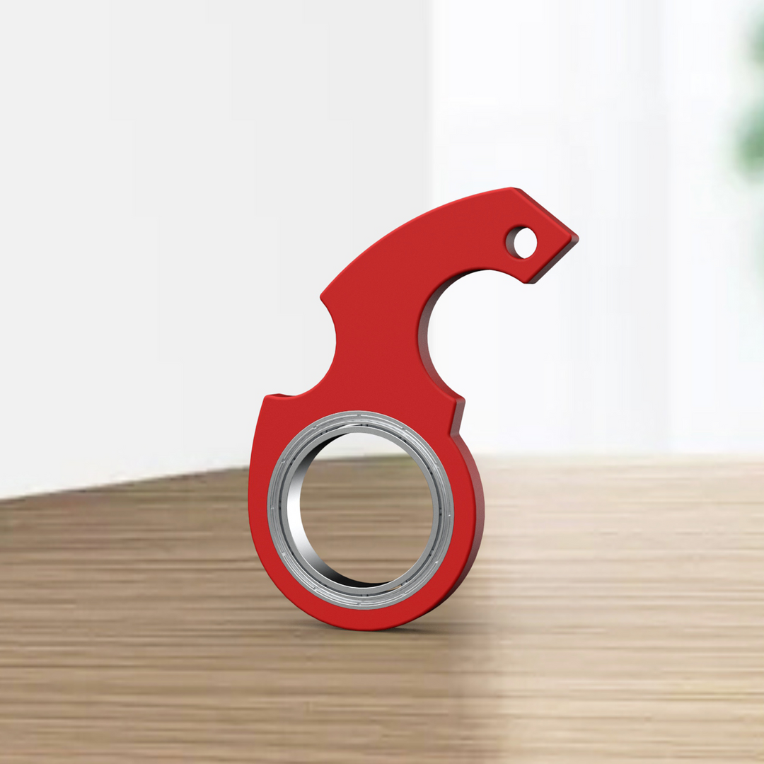 Röd fidget spinner på nyckelring