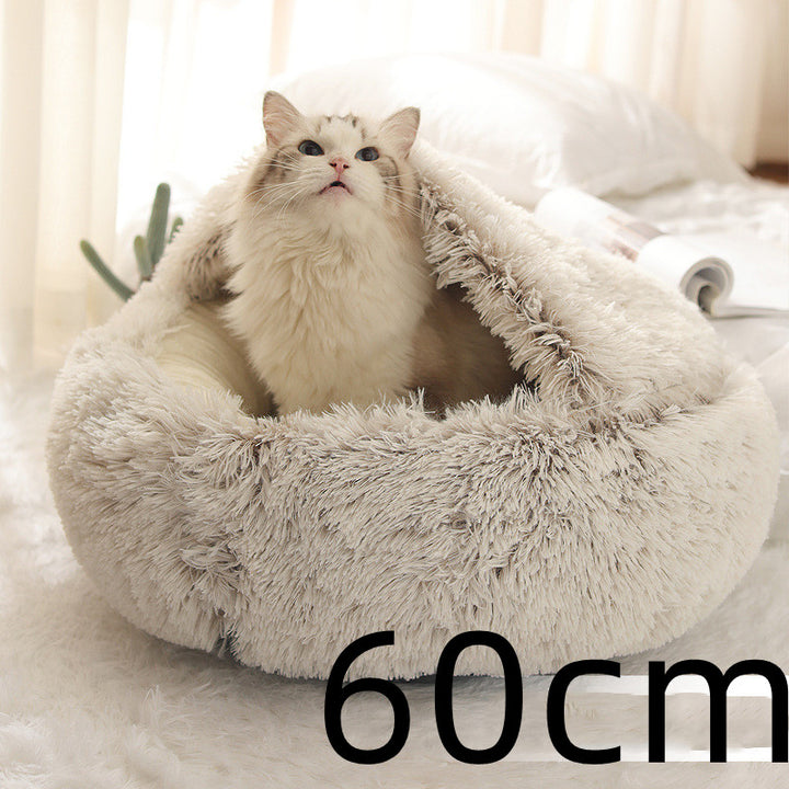 Katt i rund plyschbädd med huva