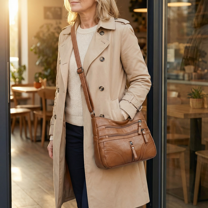 Caressa – Mjuk läder handväska crossbody med flera fickor